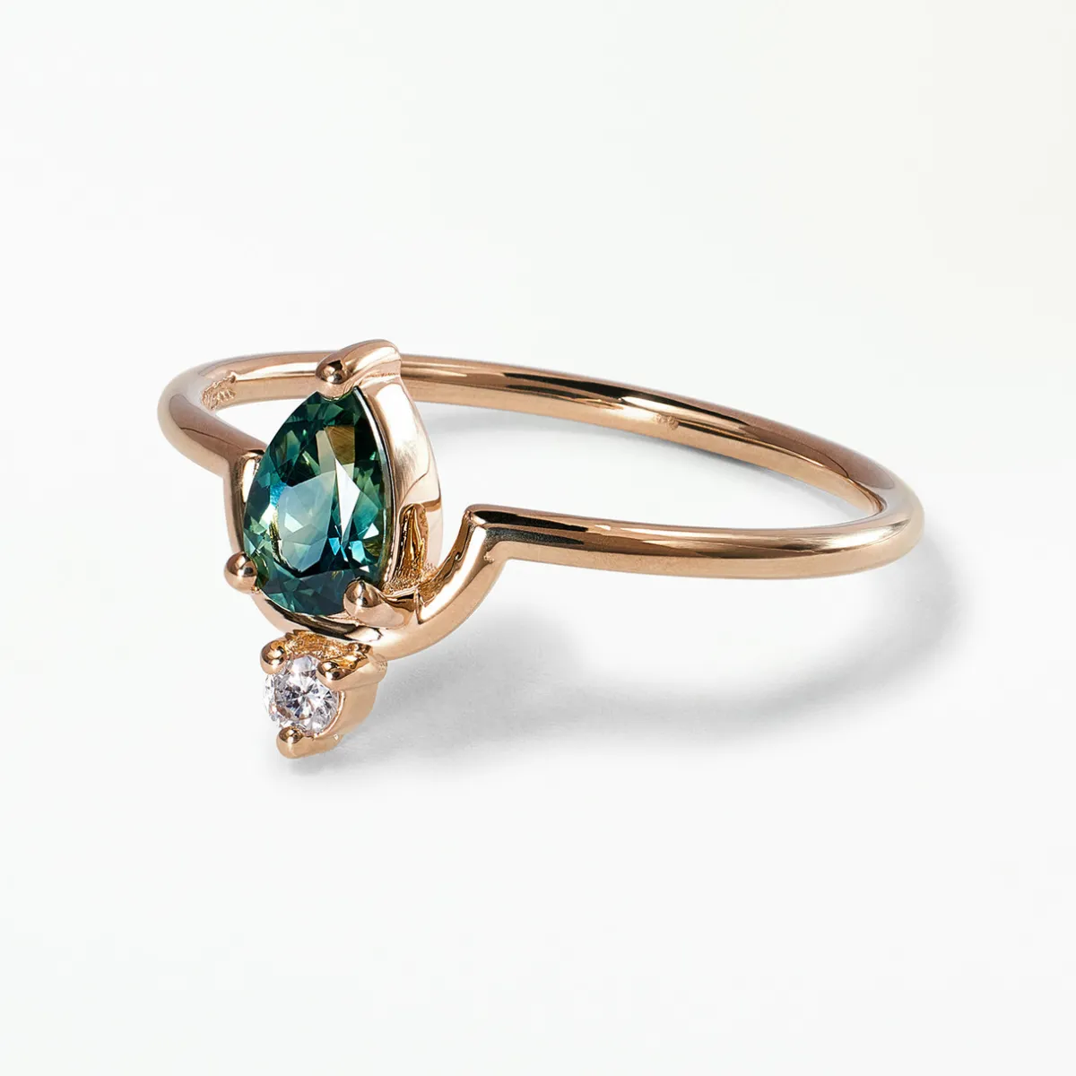 Tomfoolery Medium Pear Cut Teal Sapphire & Diamond Nestled Ring Fashion