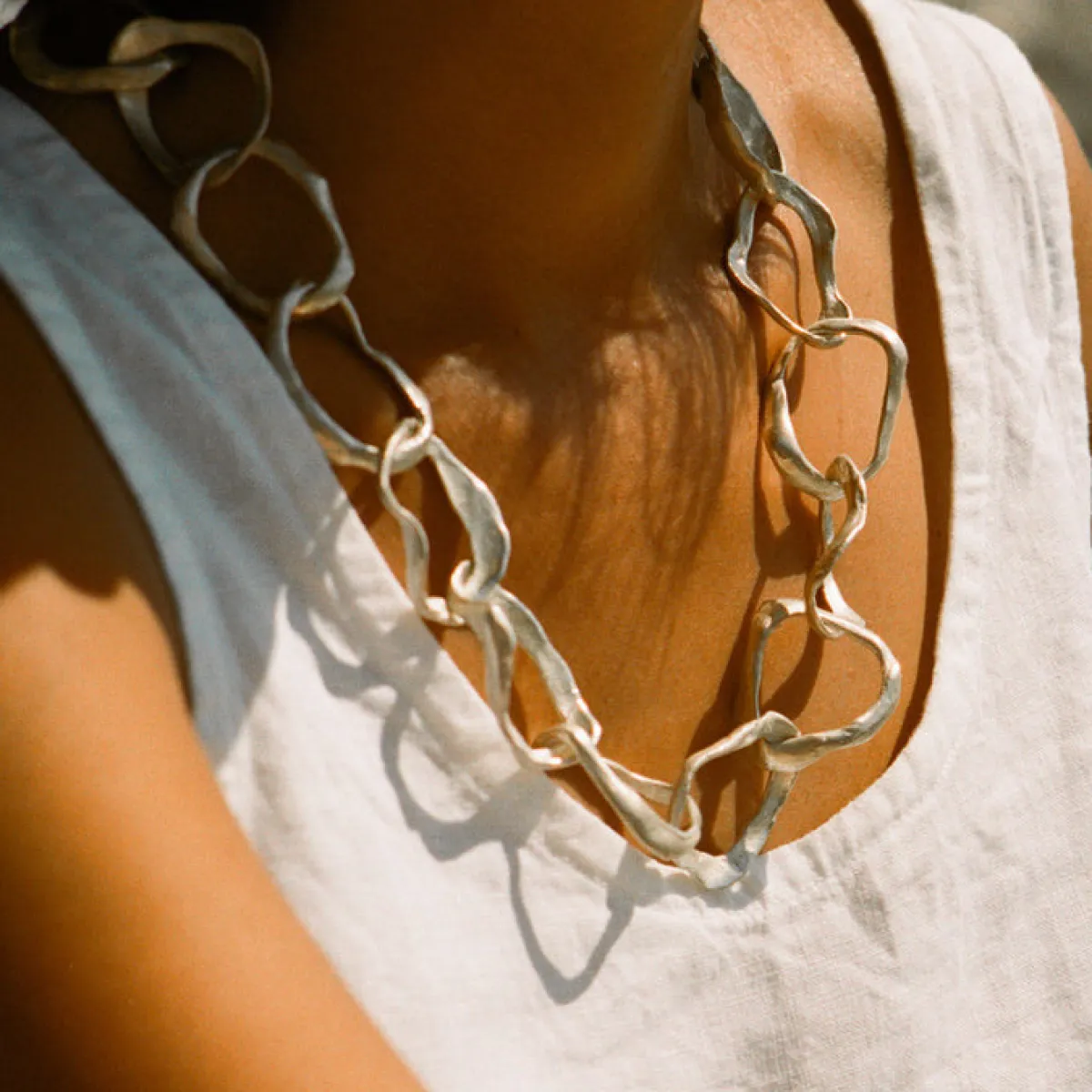 Tomfoolery Rock Drawing Silver Necklace Online